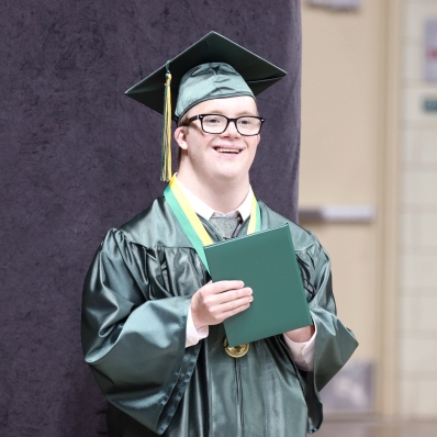 student with diploma